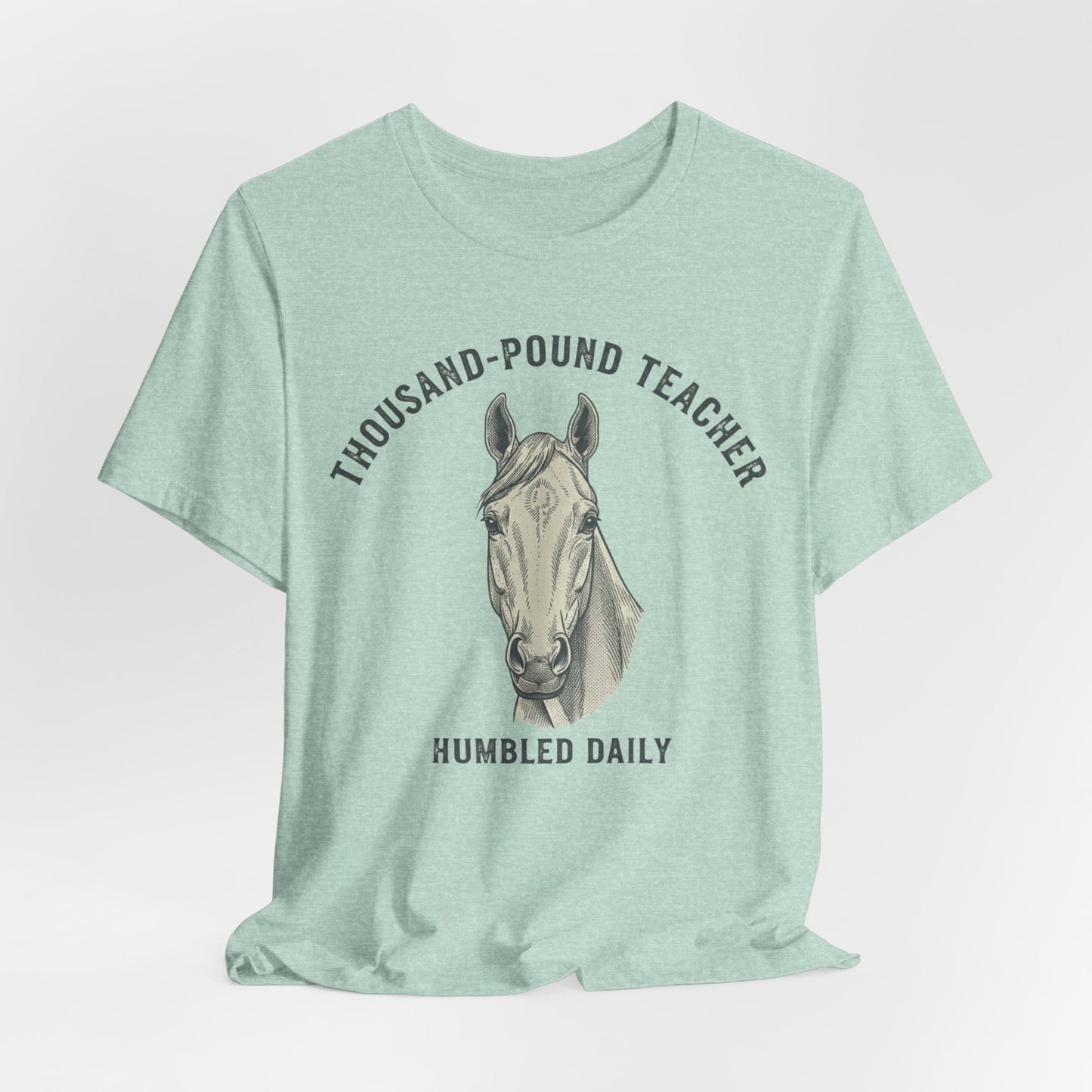 Horse Teacher T‑Shirt – "Thousand‑Pound Teacher, Humbled Daily" Graphic Tee