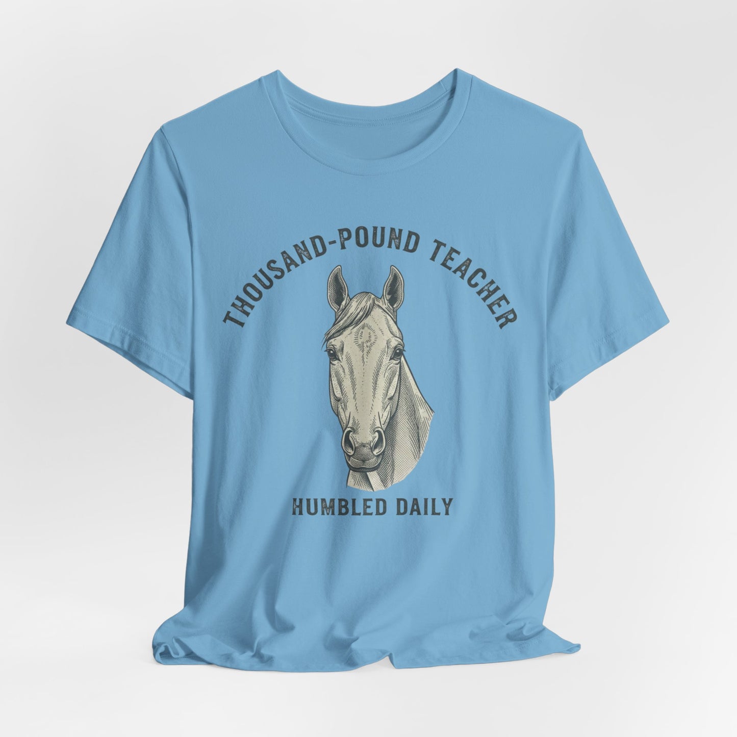 Horse Teacher T‑Shirt – "Thousand‑Pound Teacher, Humbled Daily" Graphic Tee
